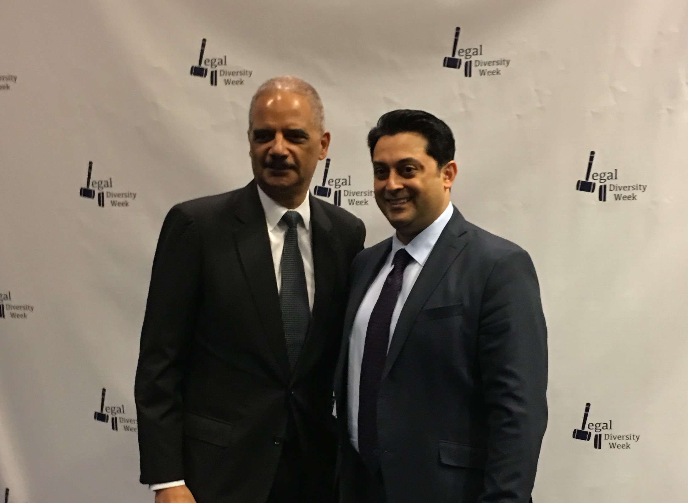 U.S. Attorney General Eric Holder presenting the Top 50 General Counsel Award to Sean Kajani